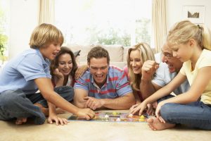 635993987158821338-2031569000_Family-Playing-Board-Game